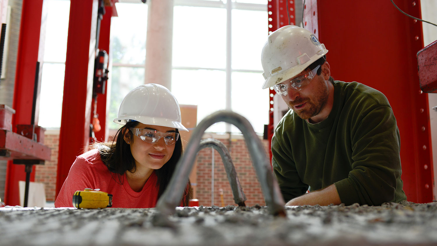 An undergraduate student works in the constructed facilities lab on campus.