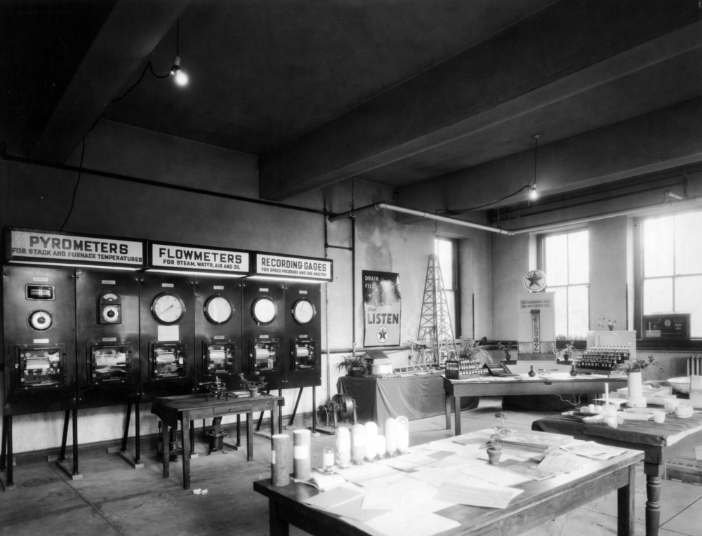 Vintage black and white image of a chemical engineering lab on NC State's campus. Circa mid-20th century.