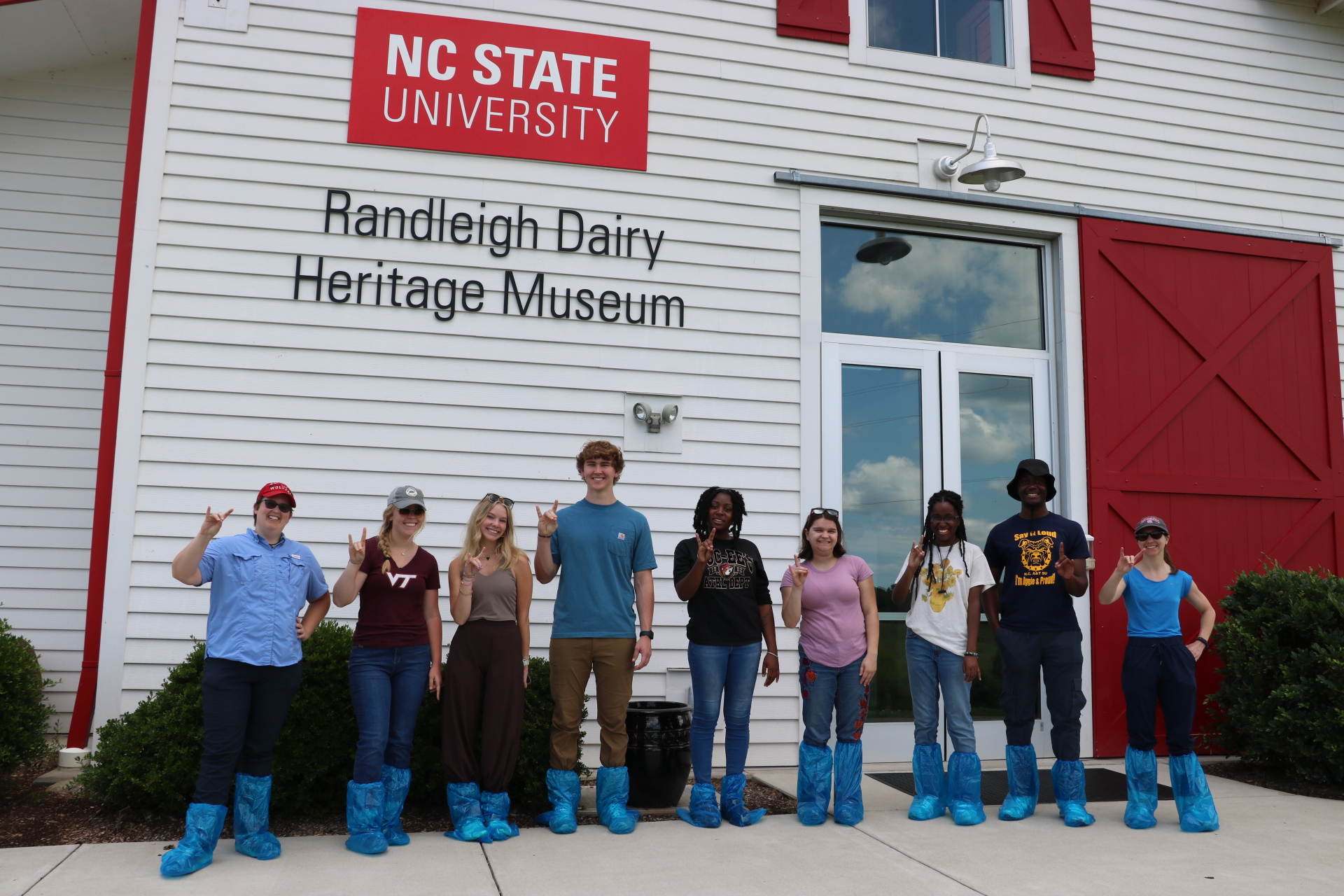 BAE undergrad students pose for a group photo at the NC State Randleigh Dairy Heritage Museum.