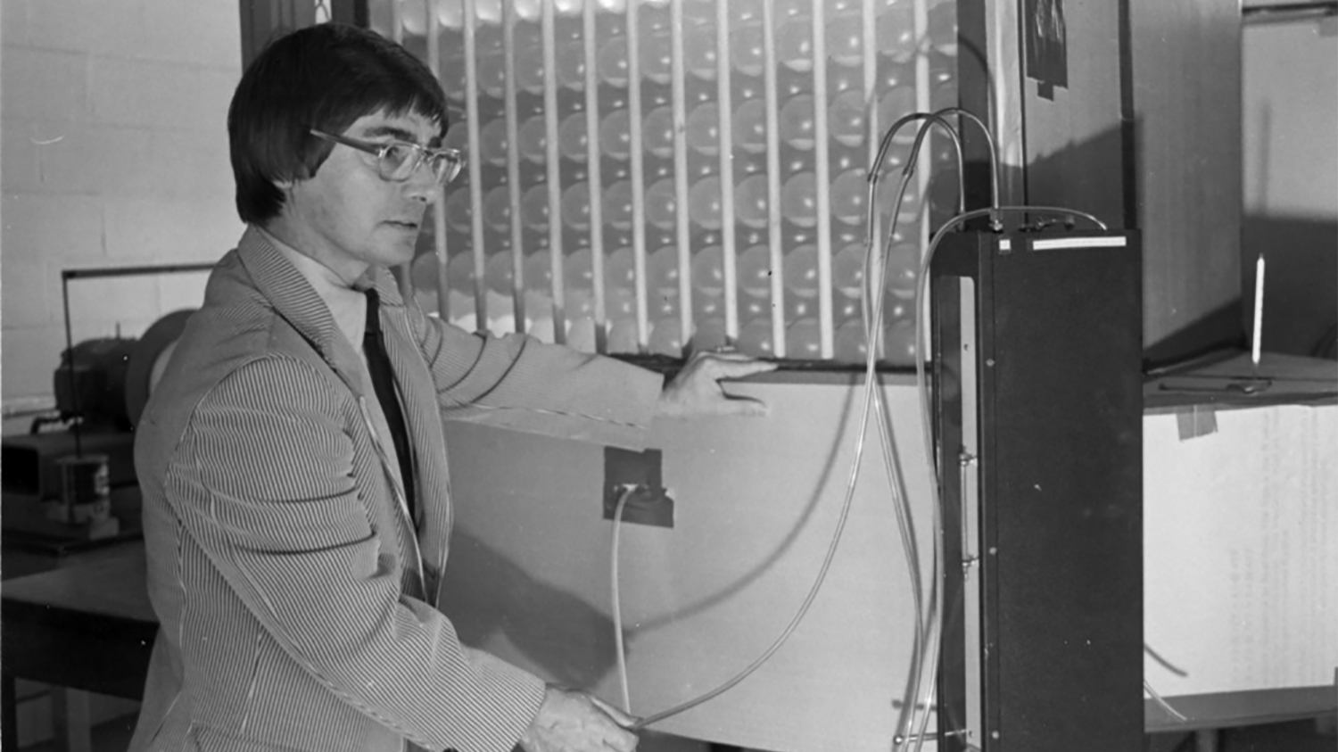 Former MAE department head, John Bailey, works in his lab in this undated photo.