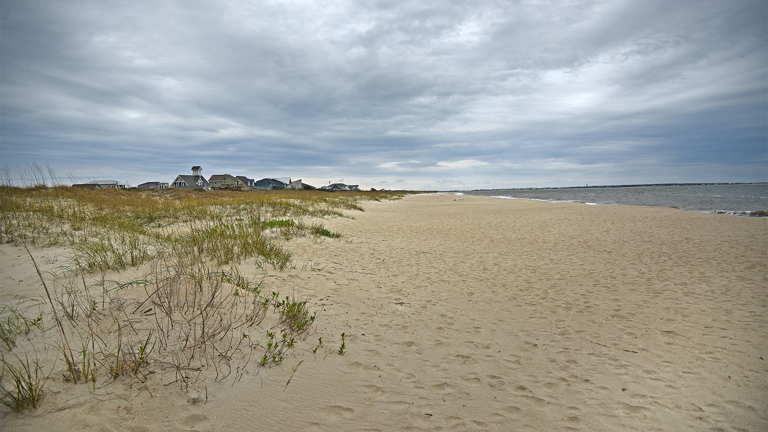 Sand strand at Caswell Beach in Brunswick County.