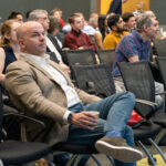 Audience members listen to Sergei Kalinin lecture.