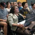 Audience members listen to Sergei Kalinin lecture.