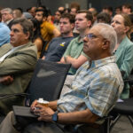 Audience members listen to Sergei Kalinin lecture.
