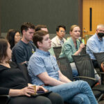 Audience members ask questions during a Sergei Kalinin lecture.