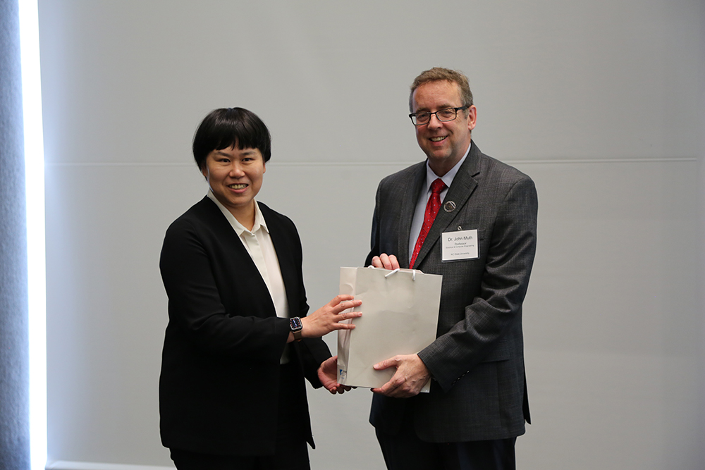 Chaoyin Chi, deputy director with the Industrial Technology Research Institute, gave NC State University a cherry blossom mug.