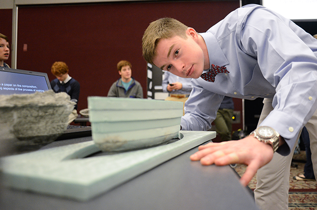 A small budget forced Conner Walker (above) and his team to make difficult choices when designing their concrete canoe.