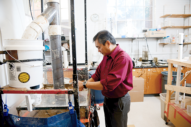 Dr. de los Reyes working in civil engineering lab
