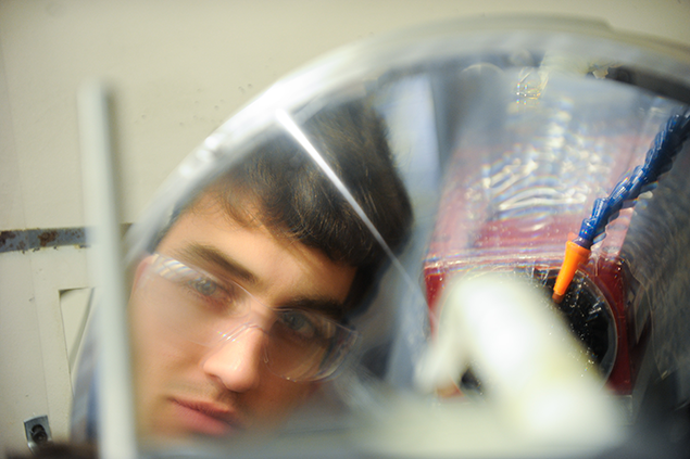 Researcher works with prototype optical system that uses interference between the beams of infrared light captured by each telescope to measure the position and spectrum of a star.