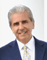 older man wearing a suit and tie