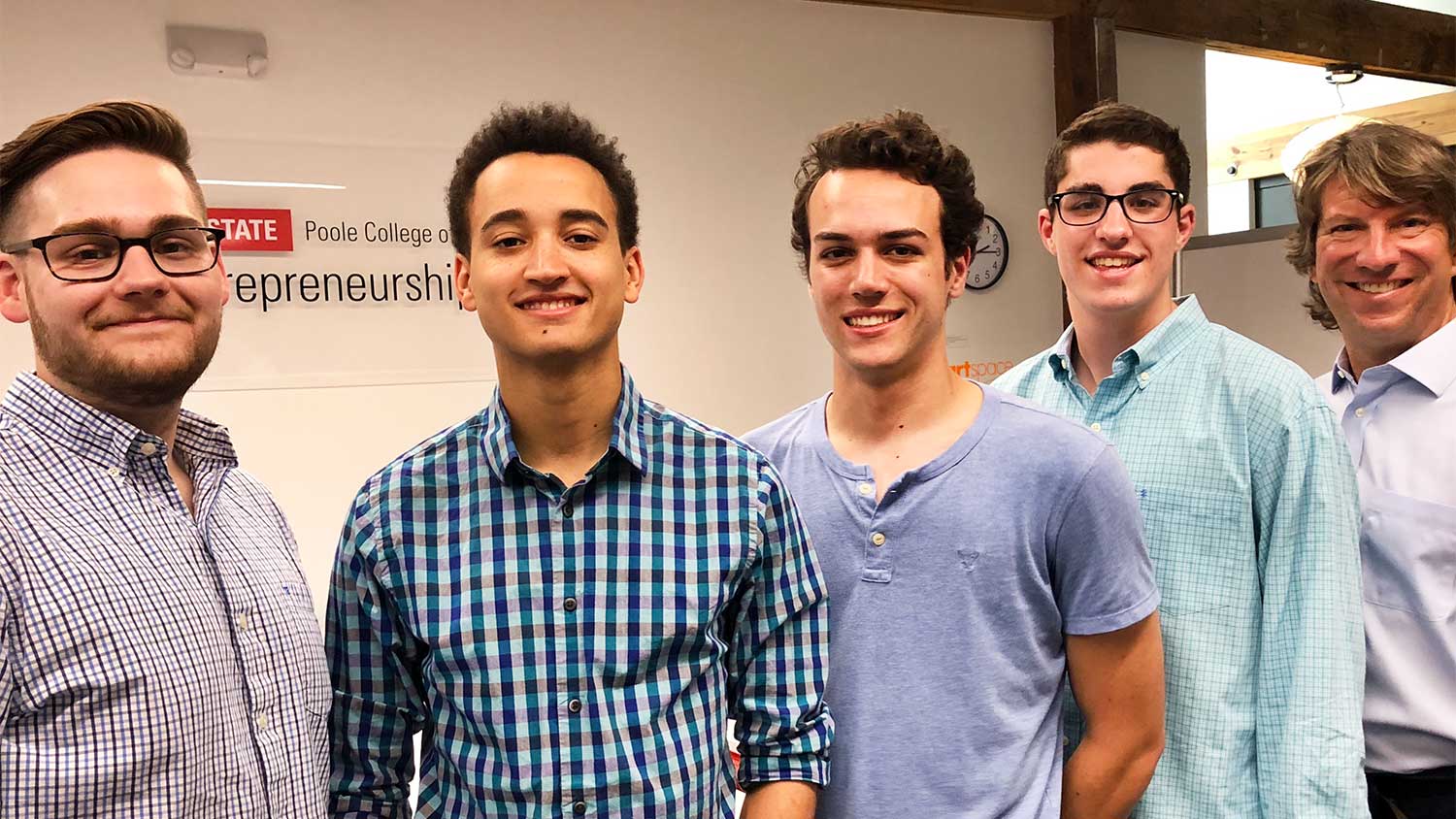 From left, the Atomo team includes NC State mechanical engineering alumnus Ryan Kelley (chief executive officer), textile technology student Aidan Special (chief product officer), computer science student Bryan Cooper (chief technology officer), business and design student David Flowers (user experience and design), and computer science alumnus Matthew Burke (president).